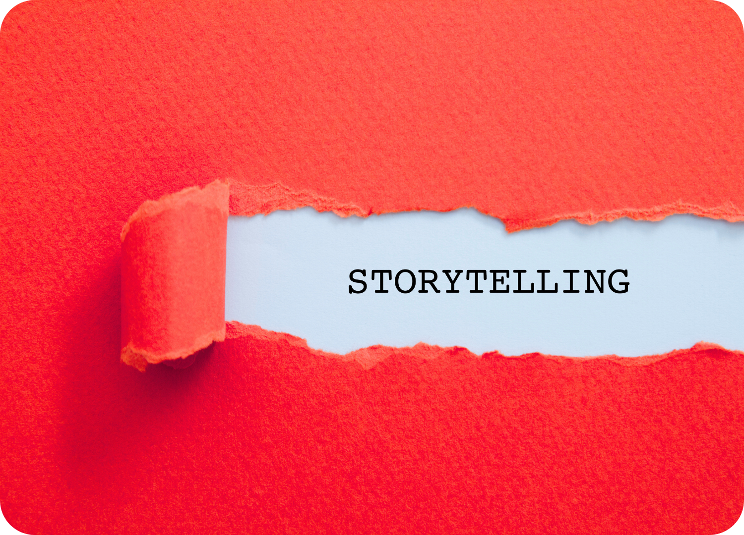 Palavra "STORYTELLING" escrita em um fundo branco, revelada por um rasgo em papel de textura vermelha.