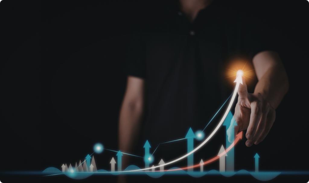 "Imagem conceitual de um homem tocando um gráfico digital ascendente. Várias setas de cores diferentes apontam para cima sobre um fundo escuro, simbolizando crescimento, sucesso financeiro e progresso tecnológico.
